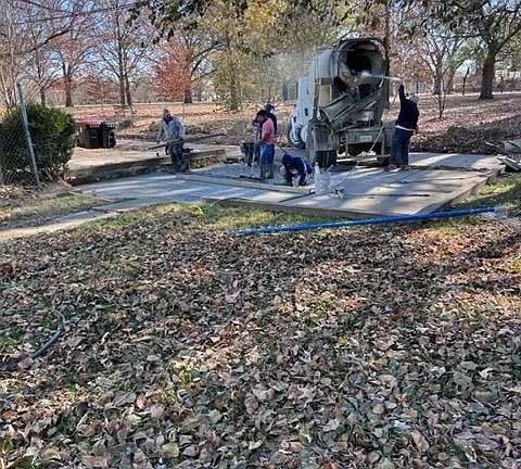 drive way / Property backs up to park