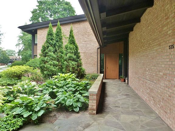 Covered front porch leading to the large entry door!