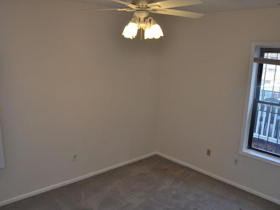 Large bedroom with 2 windows and double closets