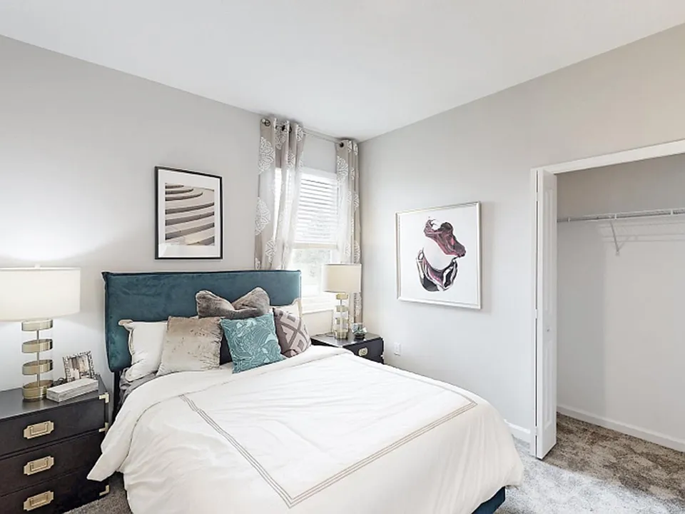 The bedroom suite is a spacious and comfortable retreat with a generous closet