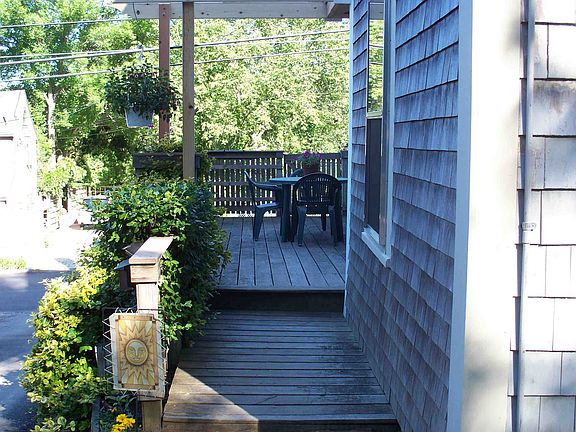 Entry onto private deck and back door from parking area