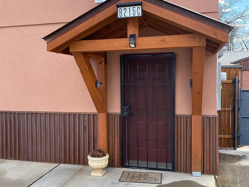 Exterior entry door. Security screen and coded entry.