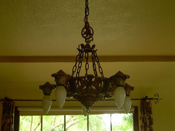 Dining room, large paned window, original light fixtures