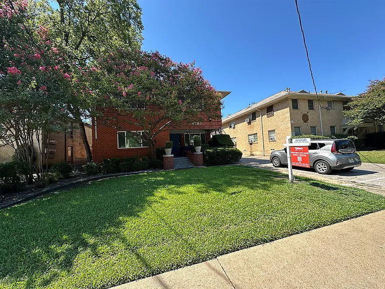 Charming exterior with a welcoming entrance, showcasing the property's curb appeal and inviting atmosphere.