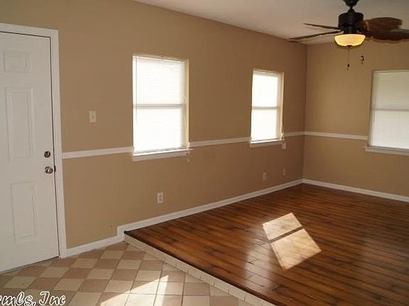 windows wrapped around living room