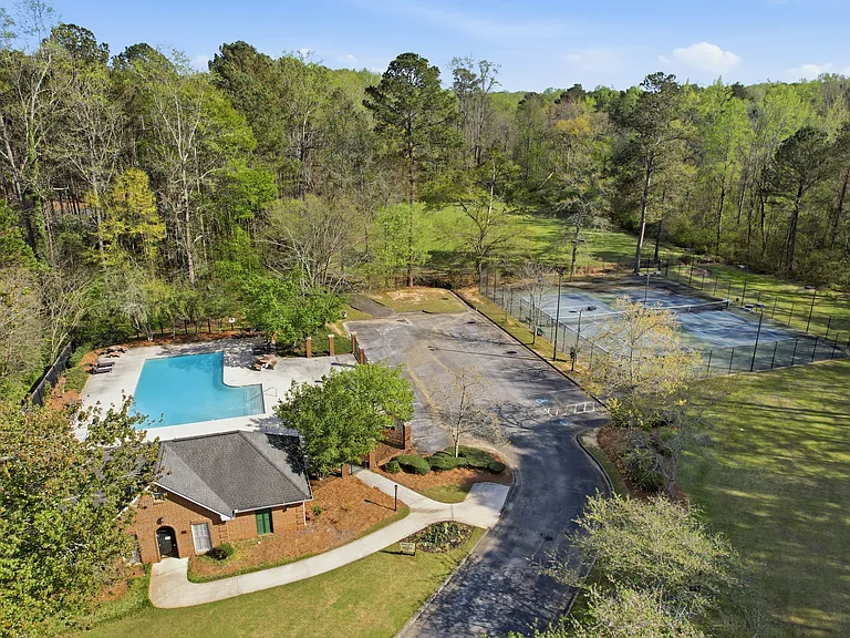 Access to community amenities including swimming, tennis, and green space