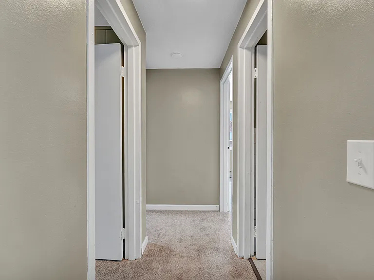 Hall connecting to bedrooms