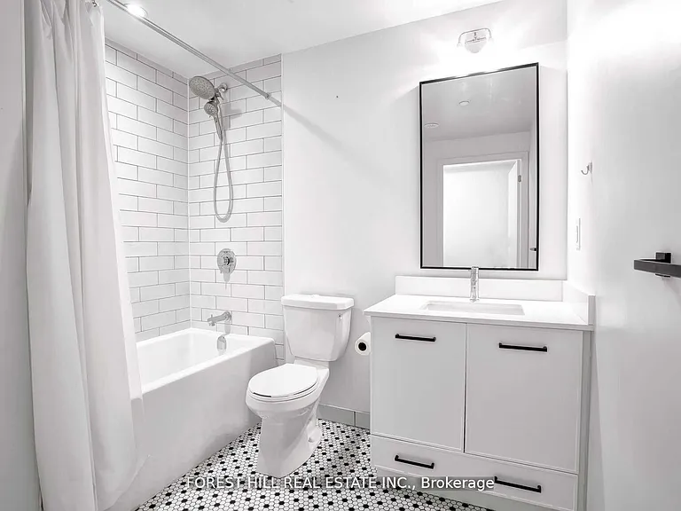 899 Queen St E #202 — Photo 12