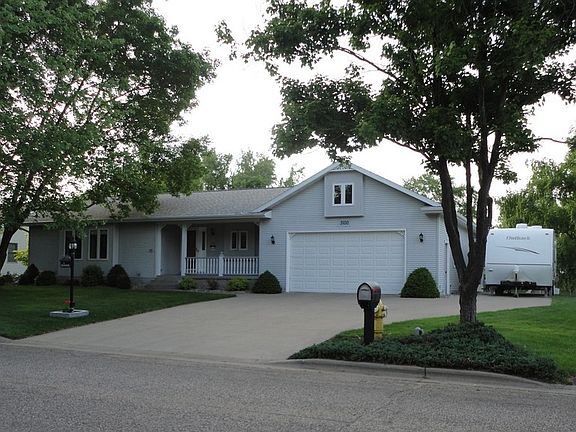 Front of house, notice RV camper spot on right of garage