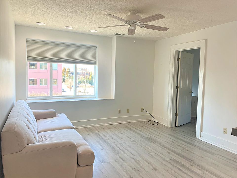Living Room with Main Street Views!