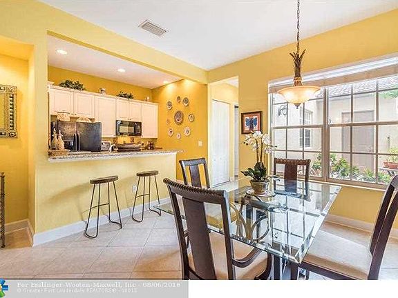 Mediterranean Inspired West Pembroke Pines Charmer - Cobblestone Town Home