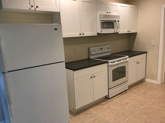 new kitchen with microwave above stove