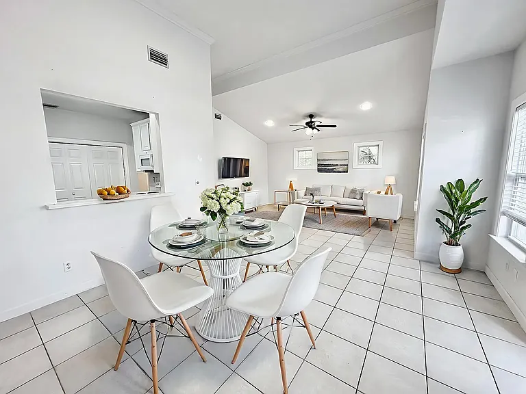 Virtually staged, dining area and living room