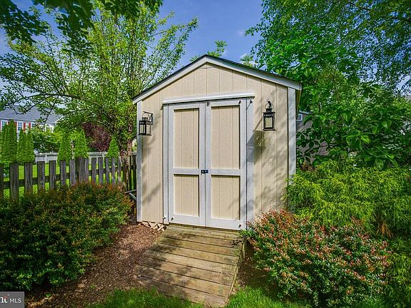 Shed in back corner of yard