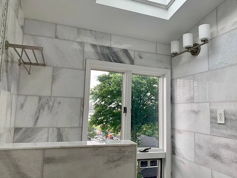 Nature greets you in the master bath.