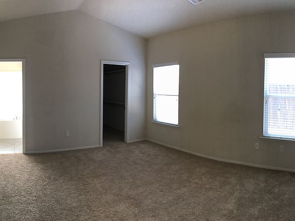 Master Bedroom with vaulted ceilings