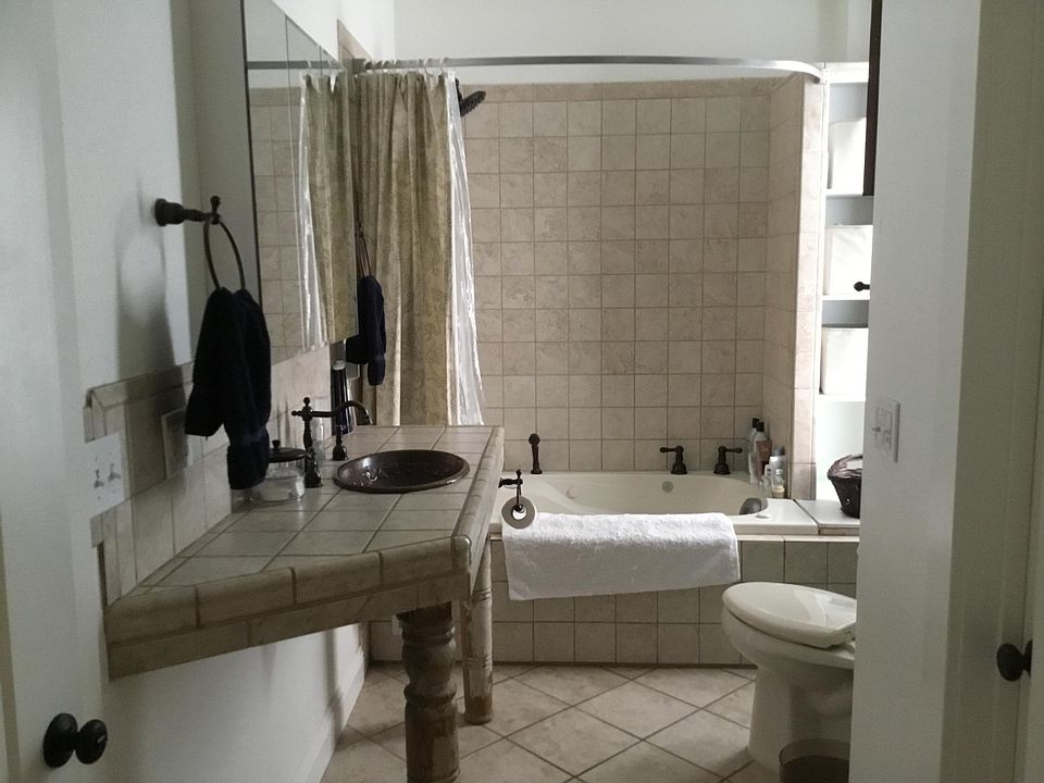 Bathroom with jetted tub.