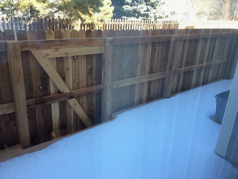 Patio and back gate leading to the greenbelt