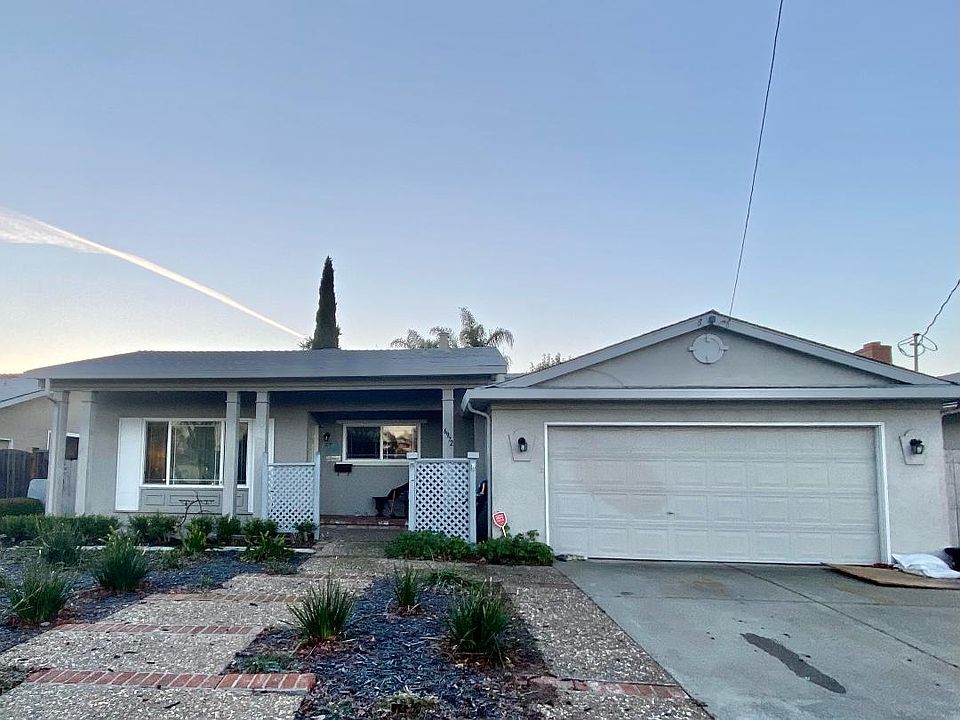 Easy maintainance front yard with watering.