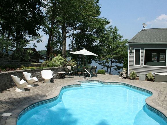 In-ground heated pool  This private oasis is even more impressive in person.