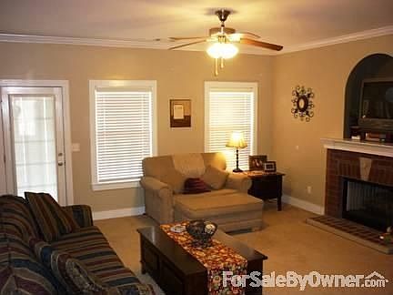 Living room
						:
						Fireplace with built-in TV and media space