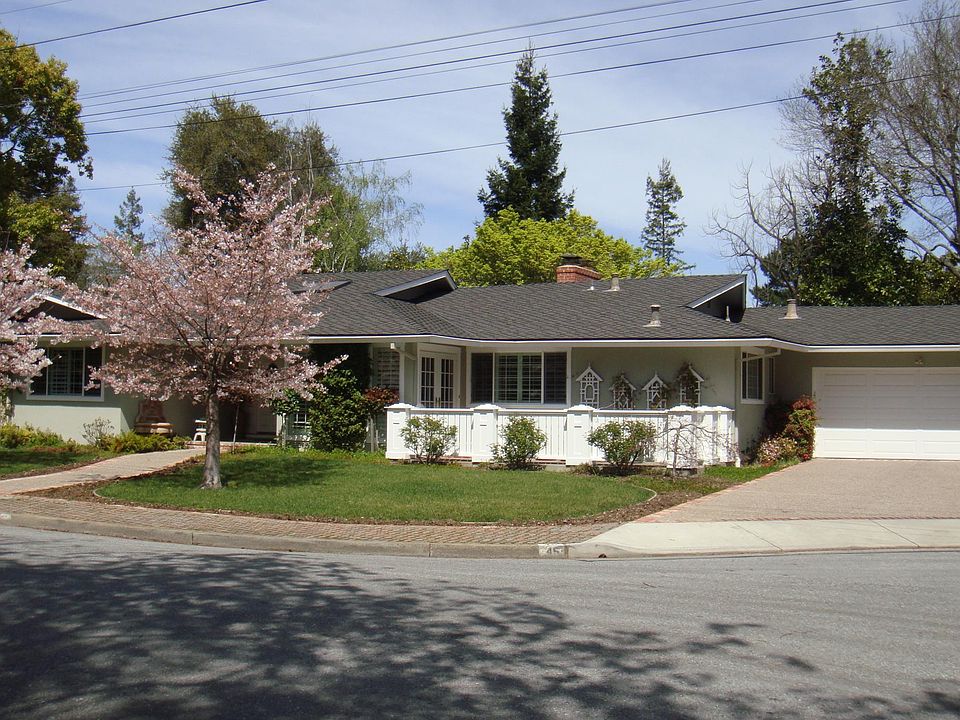 On cul-de-sac with large two car garage and ample driveway and street parking