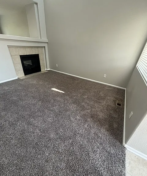 entry into living room with gas fireplace