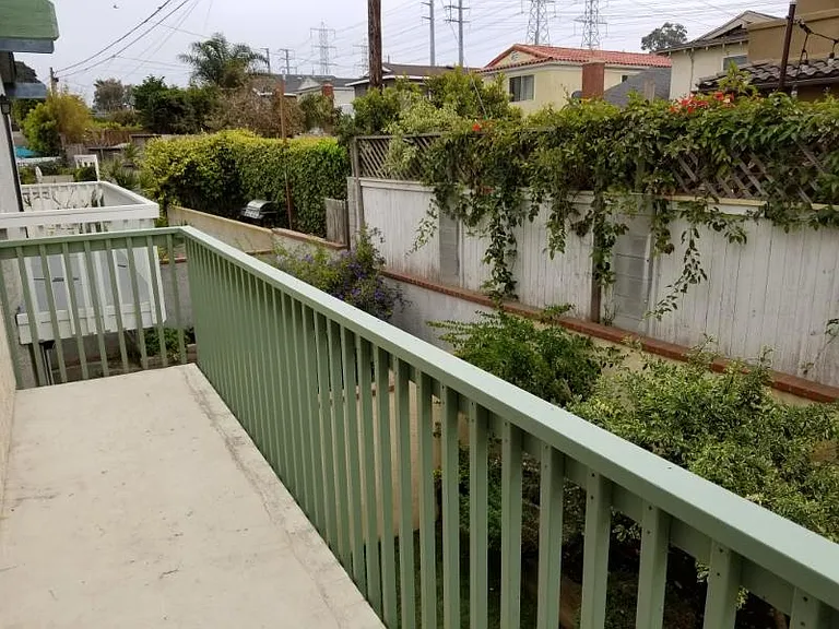 Deck off upstairs back bedroom.