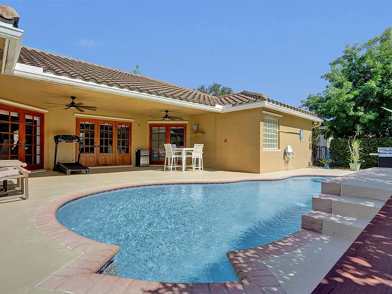 4142 NW 58th Dr — Photo 62