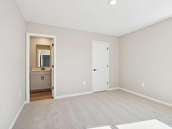 Secondary bedroom in the Taylorsville floorplan at a Meritage Homes community in Raleigh, NC.