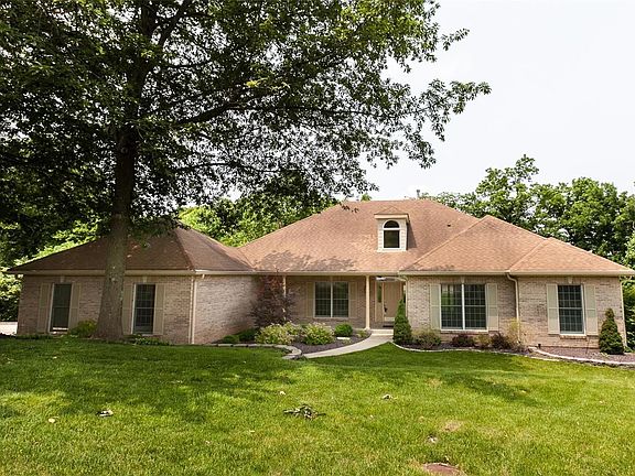 Spacious 4+ bedroom, 3 full bath, open floor plan ranch home situated on a private 1.21 acre lot in Woodmere at the Bluffs subdi