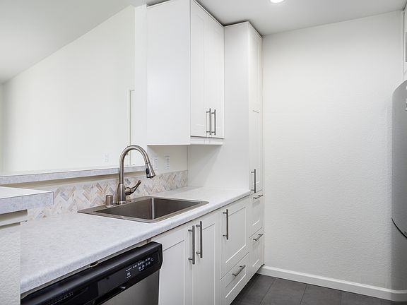 - Upgraded kitchen with modern appliances and finishes
- Tile flooring
- Plenty of kitchen storage space including pantry