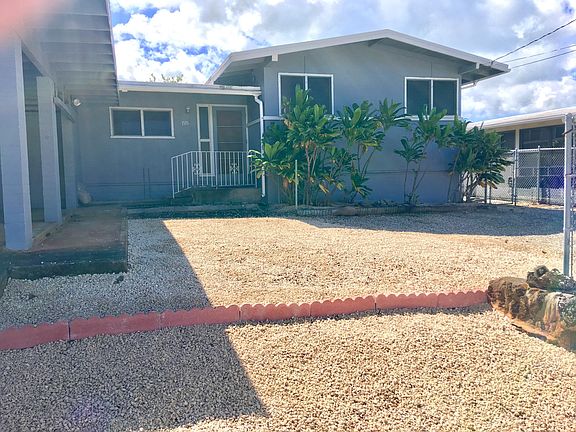 Spacious front lawn with large yard, perfect landscape for the DIY gardener