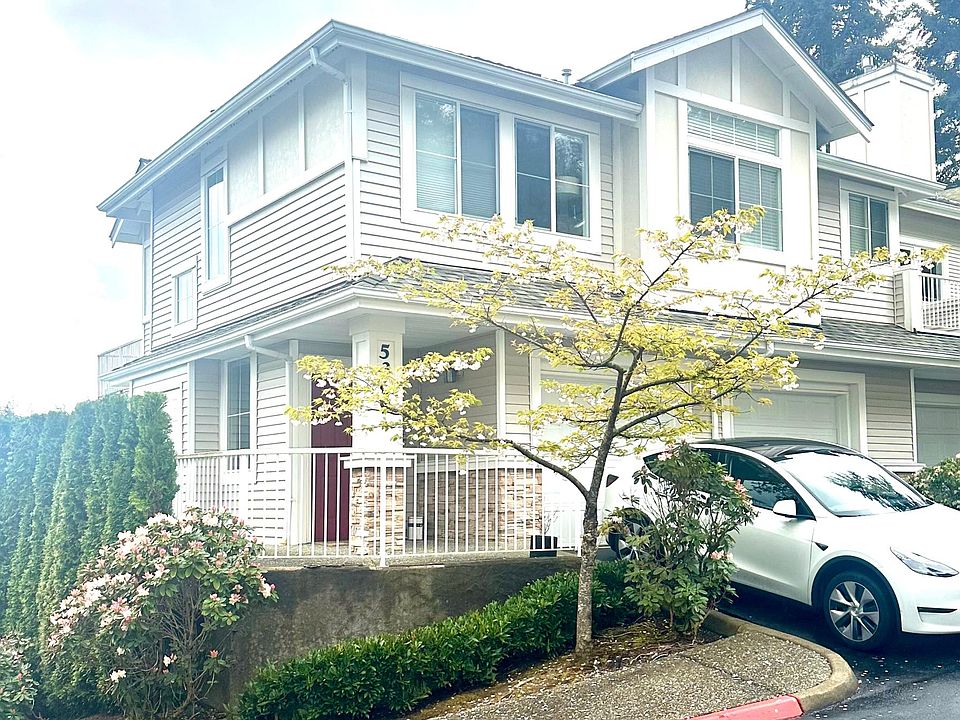 end unit with private entrance and attached garage!