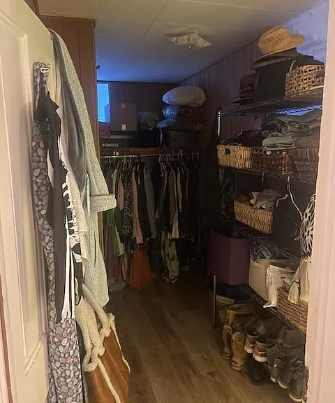 This tenant uses the seond bedroom as a walk-in closet. Newer flooring.
