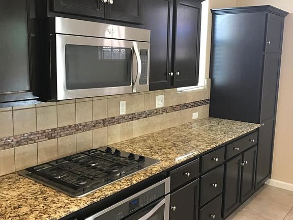 Gourmet Kitchen with Stainless Steal Appliances and Granite