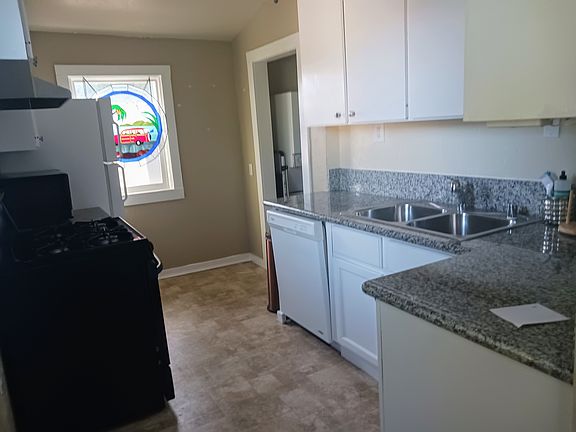 kitchen with granite counters, frig.
oven, microwave, toaster and Keurig
