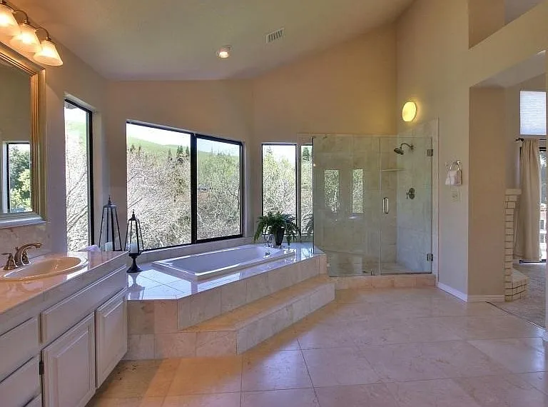 Primary Bathroom with Oversized Bathtub and Custom Shower