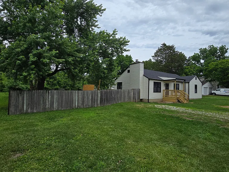 Side of house
Off street parking for 2 full size vehicles