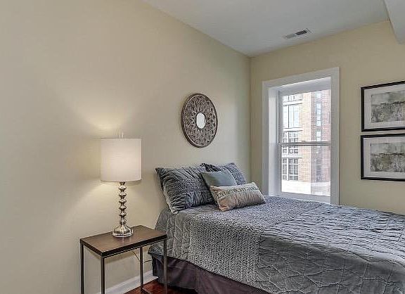 Bedroom #2 can comfortably fit a Full/Queen bed. The room can also serve as an at-home office space.