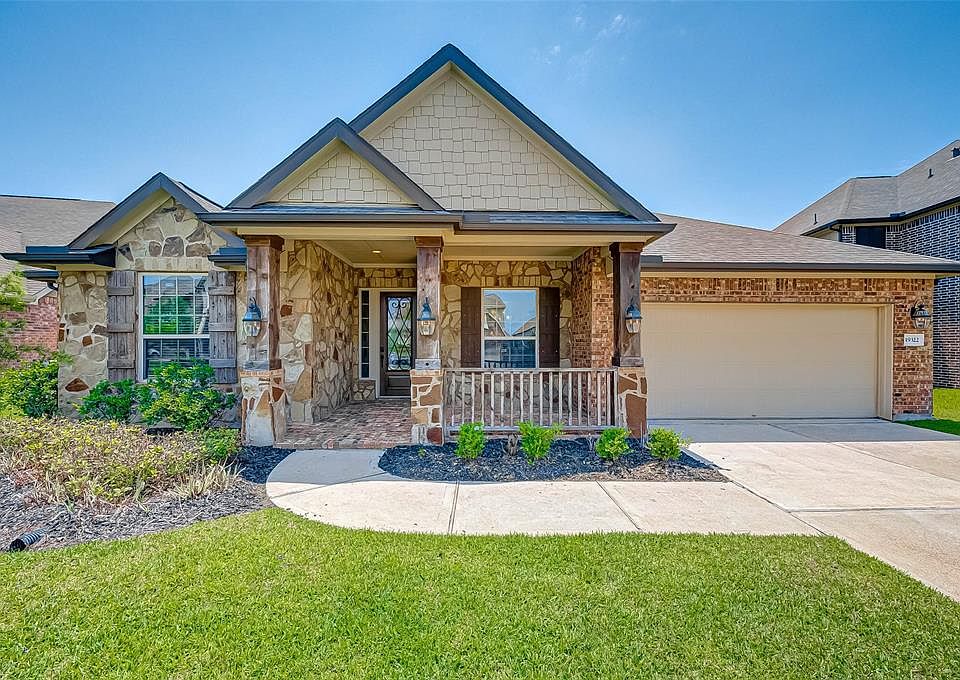 Welcome to this charming and comfortable 1 story with stone and brick exterior.