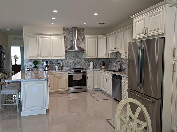 Fullly-equipped kitchen with plenty of storage.