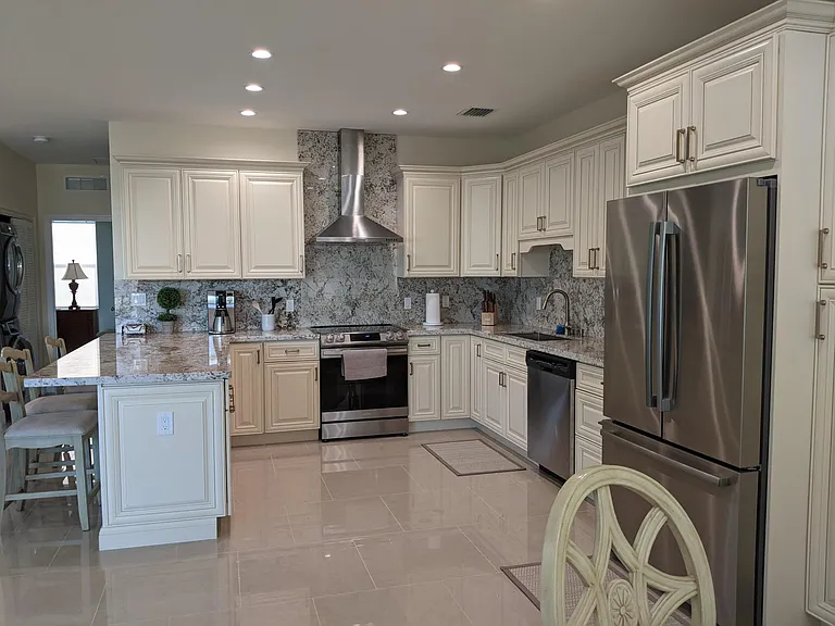 Fullly-equipped kitchen with plenty of storage.