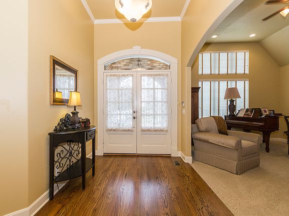 Hardwood floors in entry and kitchen