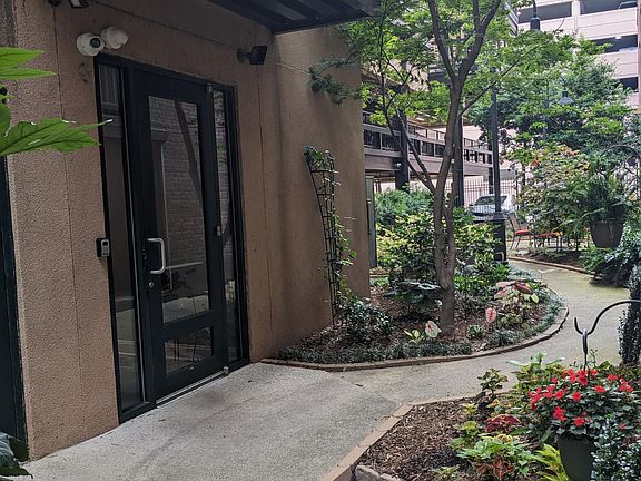 Secure entrance on side of building