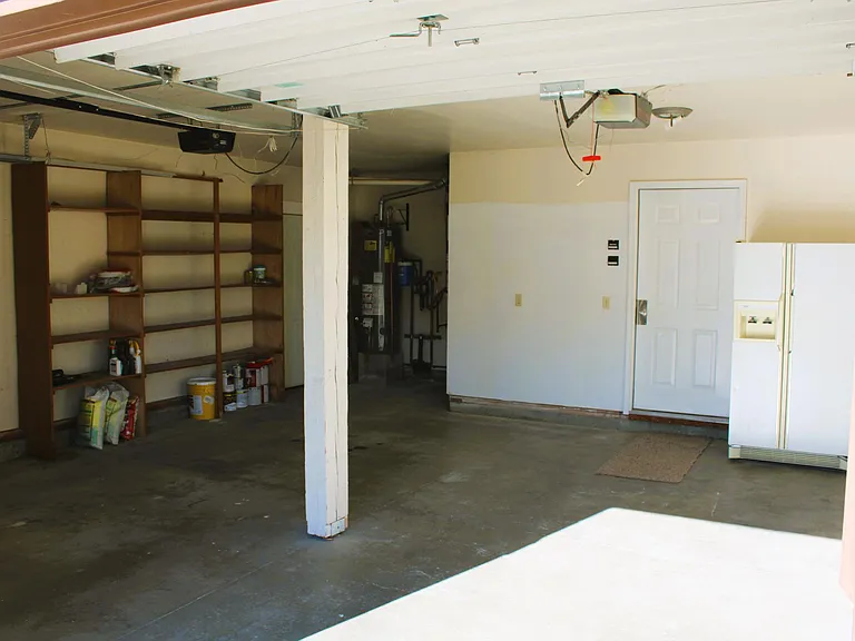Double garage with extra refrigerator provided for tenant use