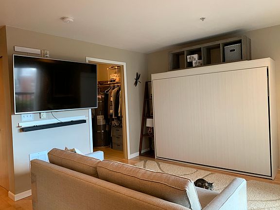 Large walk in closet, queen sized Murphy bed stays, just bring your mattress