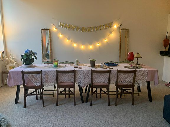 Dining table. Large space, could have plenty of other uses.