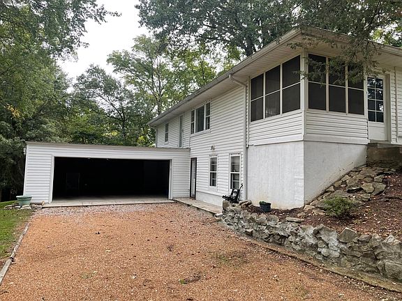 Large two car garage and screened in porch
