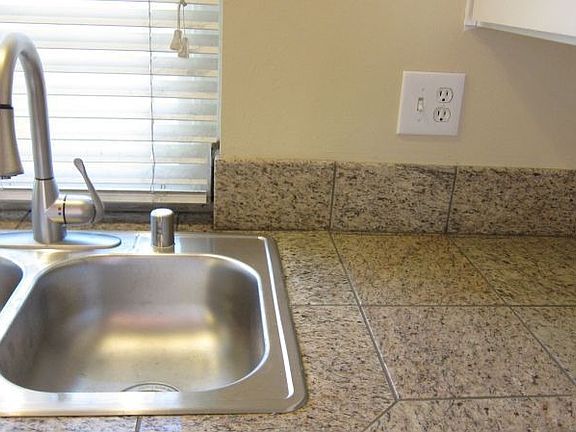 New Granite Counters w/ Stainless Fixtures